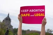 Keep Abortion Safe And Legal sign at a Stop Abortion Bans Rally